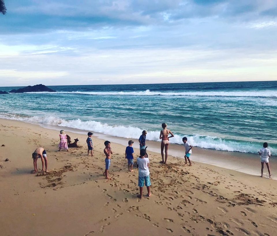 Children playing in the shorebreak at Ahangama Beach