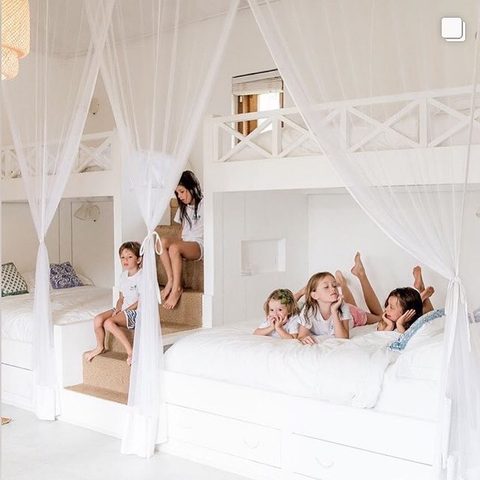 Children relaxing on the custom bunks in the Tea Tree Villa kids room