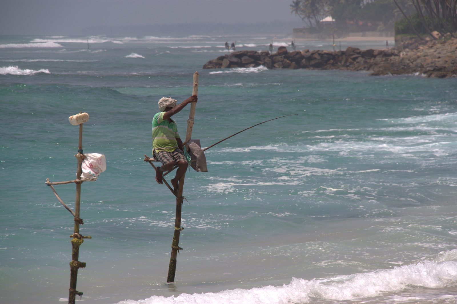 A stilt fisherman on the South Coast of Sri Lanka
