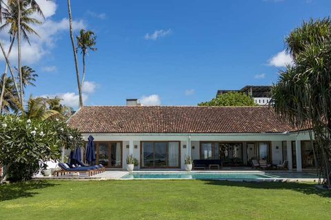 The villa frontage and tropical garden