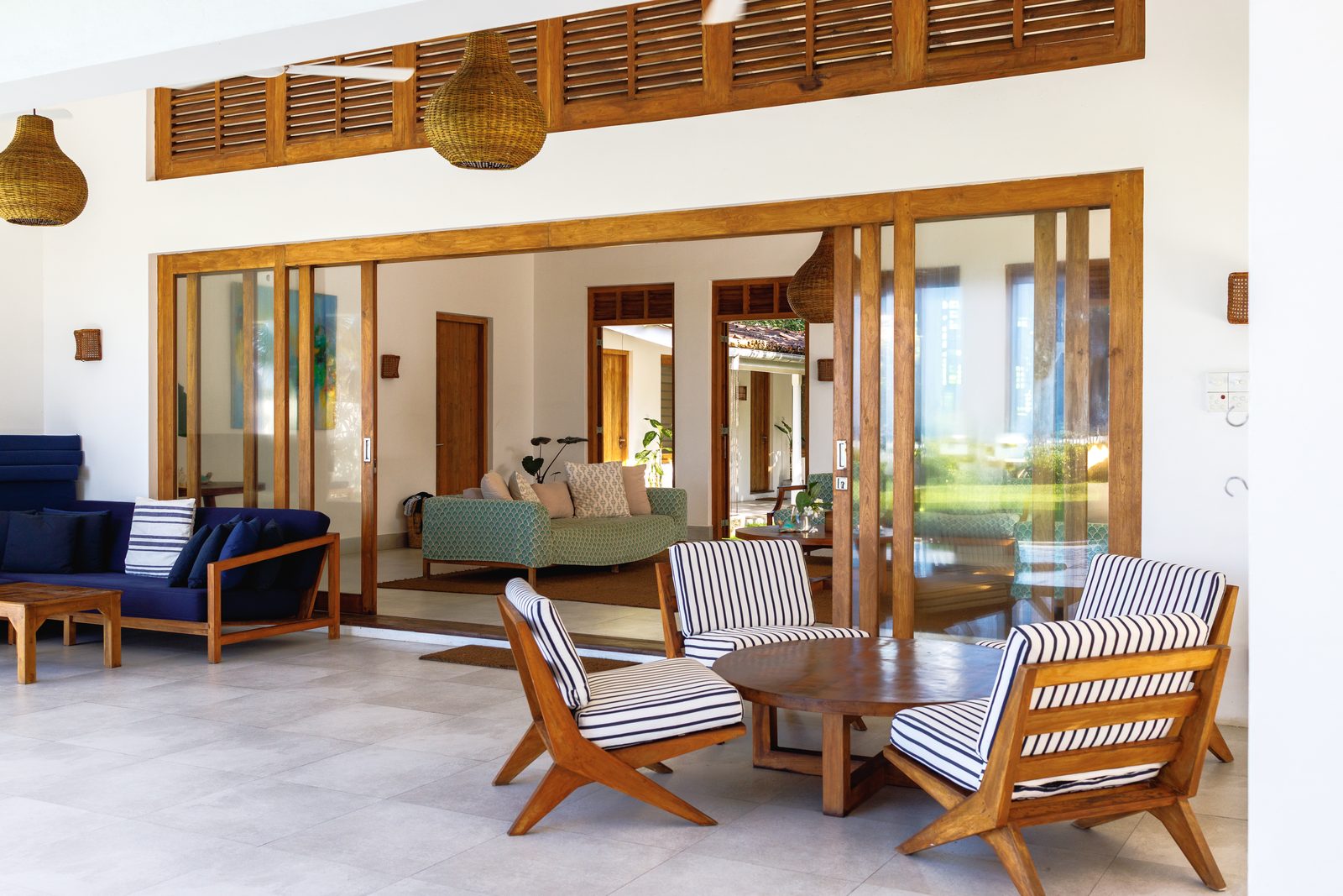 Navy sofas in the open-plan living pavilion